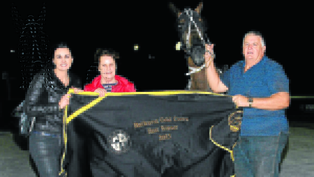 CHASING GOLD: Trainer Sam Dimarco (right) poses for the winners’ photo with his daughter Marissa and wife Michele, after Shadow Runner won his heat of the Bathurst Gold Crown Series. Photo: Coffee Photography & Framing Dubbo 
