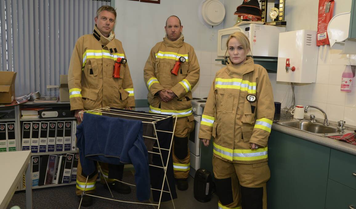 WINTER WARNING: Kelso firefighters Rod Dennis, Chris Fishbeck and Julia Warren remind residents that the biggest risks when it comes to fire safety in the home are from people trying to heat their homes and dry clothes inside. Photo: PHILL MURRAY 052716pfire