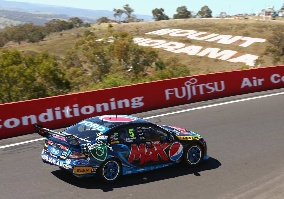 NEED FOR SPEED: While no other entry was able to complete 161 laps of Mount Panorama faster than Mark Winterbottom’s Falcon last year, he knows his Ford has issues that must be rectified before the 2014 Bathurst 1000 next Sunday. Photo: GETTY IMAGES 	092914frosty