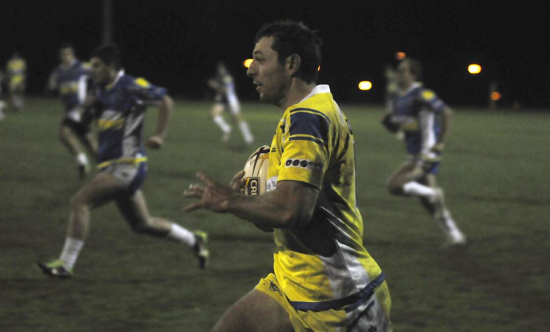 DOUBLE: Rob McMahon scored two tries for CSU Yellow in their 44-16 win over their Blue club-mates in the Centennial Coal Cup’s university derby on Wednesday night. Photo: CHRIS SEABROOK 	071614csu2a