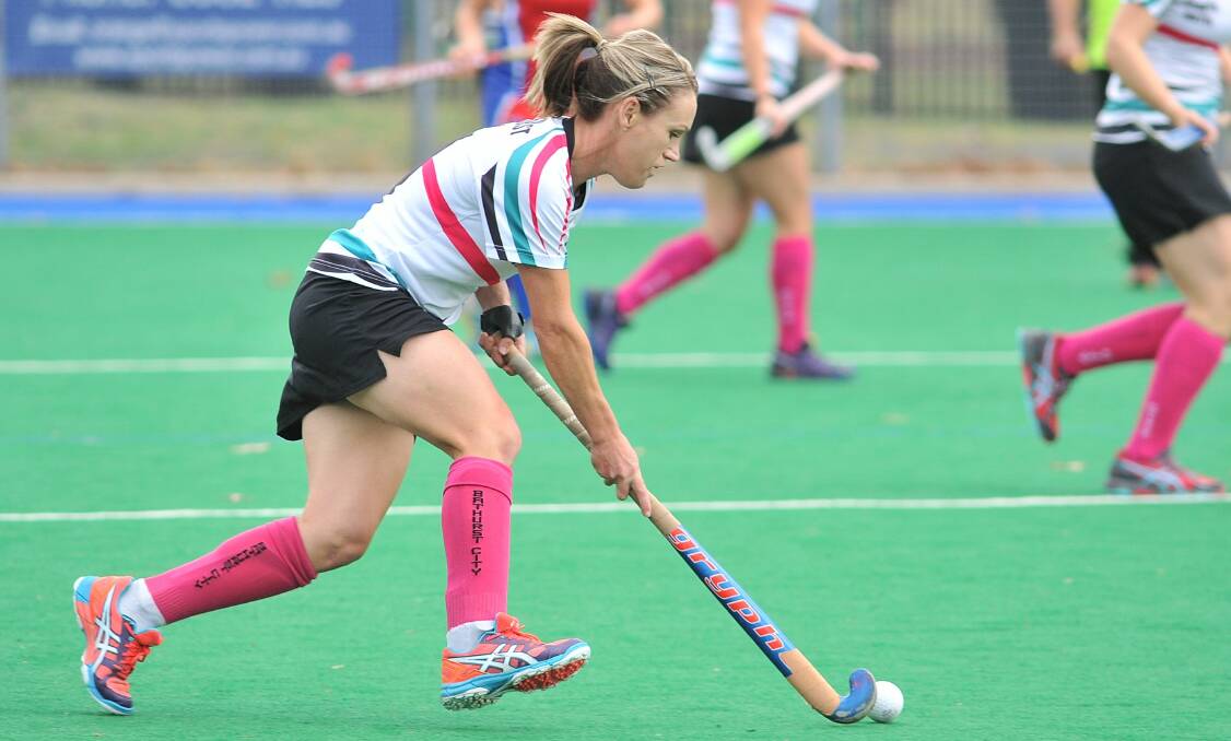 LET'S TALK: Bathurst City player-coach Lisa Quinn had some stern words for her team at half-time on Saturday in their match against Confederates. What she said worked as City went on to win 3-0. Photo: Steve Gosch 0430sghock7