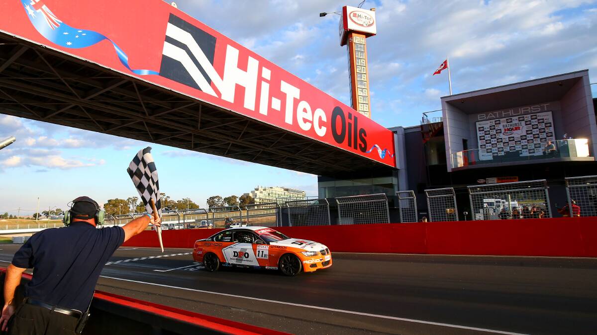 SUCCESS: Chaz Mostert crosses the line to win the Hi-tec Oils Bathurst 6 Hour with Nathan Morcom. 