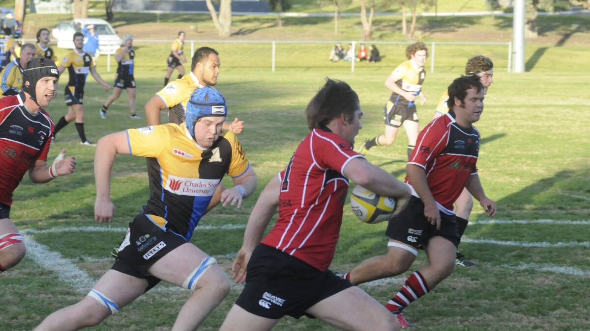 BACK ON TRACK: Charlie McIntosh (blue headgear) and his CSU team-mates will be looking to snap a four-game losing streak when they meet Dubbo ’Roos tomorrow. Photo: CHRIS SEABROOK 	051615csu3
