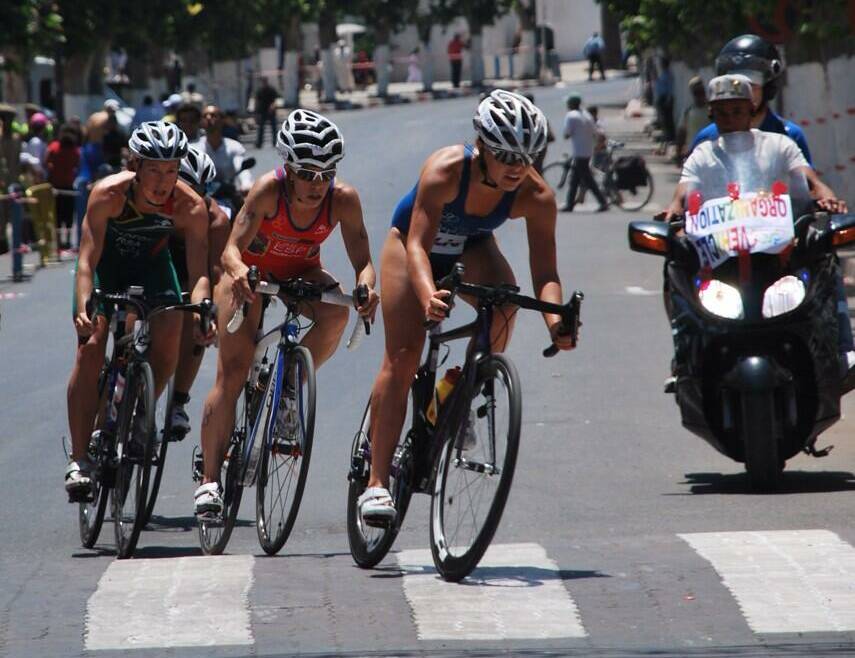 LEADING THE WAY: Bathurst triathlete Tamsyn Moana-Veale leads the way in the cycle leg of the Larache ATU Sprint Triathlon African Cup in Morocco on Saturday. It will be her last race for some time as she needs to recover from a stress fracture. 	062614tamsyn