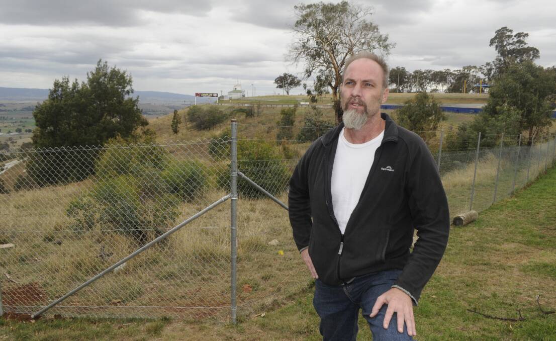 EASY SOLUTION: Ecologist and Kangaroo Project member, Ray Mjadwesch, says that if Bathurst Regional Council adopted the fencing strategy suggested by experts, another roo cull would not be needed on the iconic Mount Panorama circuit. Photo: CHRIS SEABROOK	033016croos3