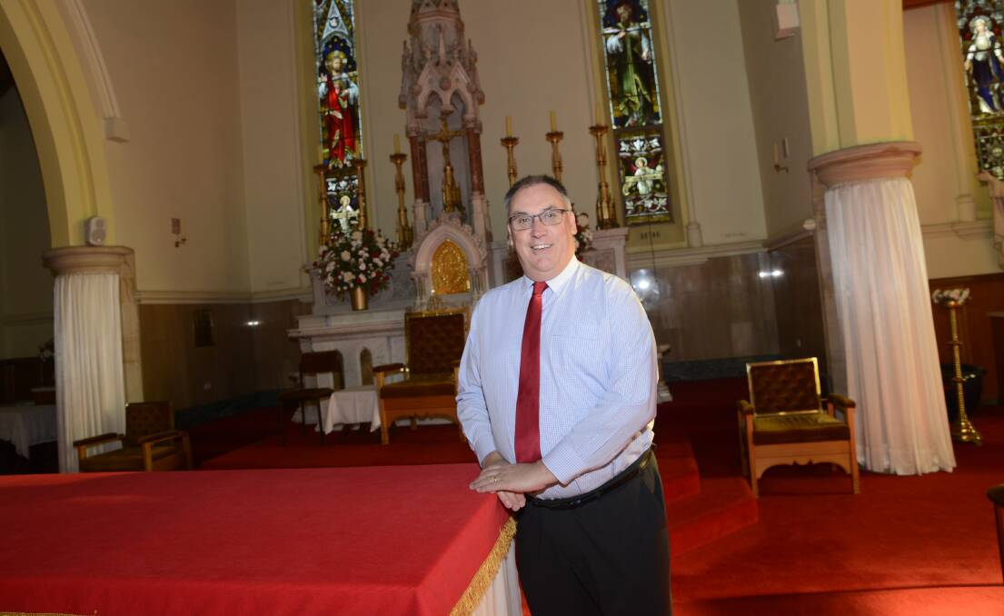 OPENING THE DOORS: Catholic Diocese of Bathurst vice chancellor Tony Eviston is looking forward to welcoming people to rarely seen areas of the Cathedral of St Michael and St John on Sunday. Photo: PHILL MURRAY	 052516ptony