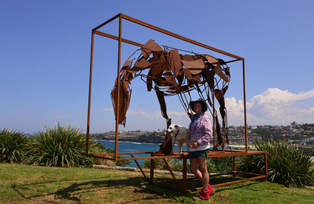 EYE ON SOCIETY: Oberon artist Harrie Fasher’s sculpture Boxed is part of Sculpture By The Sea at Bondi Beach. Photo: SUPPLIED 	102115harrie