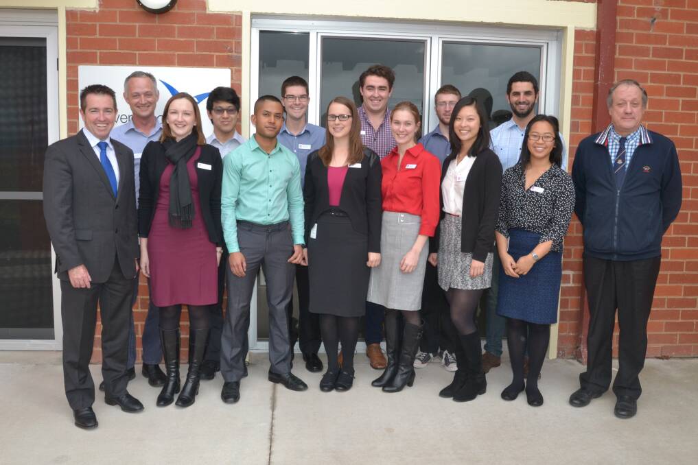 LEARNING RURAL WAYS: Member for Bathurst Paul Toole and Dr Tim McCrossin (right) welcome the new undergraduate medical students from the University of Western Sydney to Bathurst. Photo: LOUISE EDDY 071014lehealth1