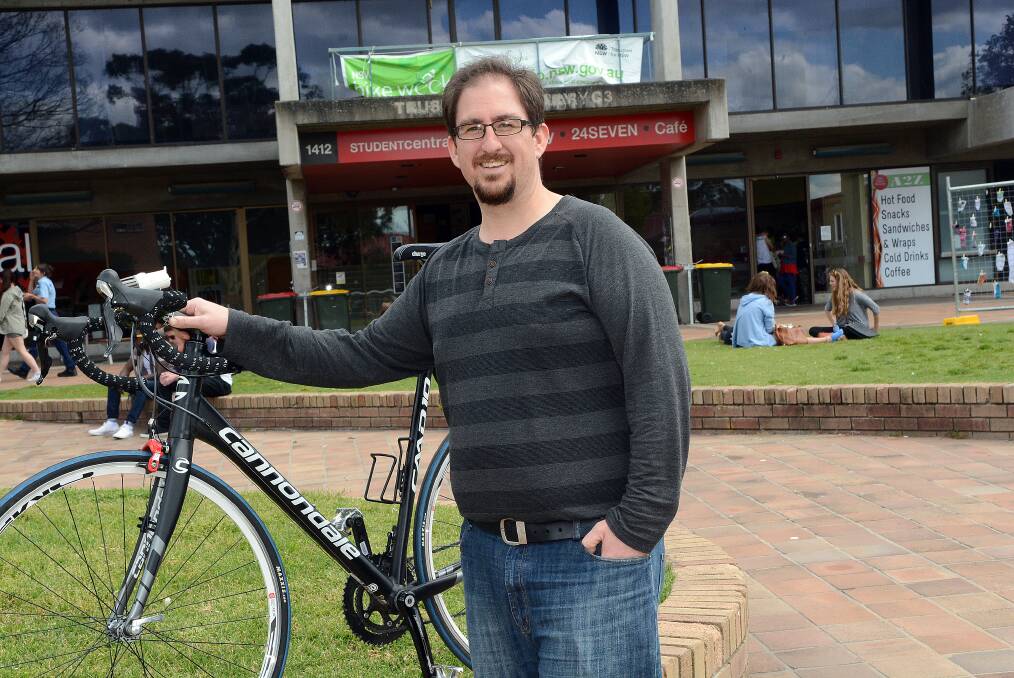 READY TO RIDE: Bathurst local Chris Dunstall is taking up the Great Cycle Challenge this year. Photo: PHILL MURRAY 092414pchrs 