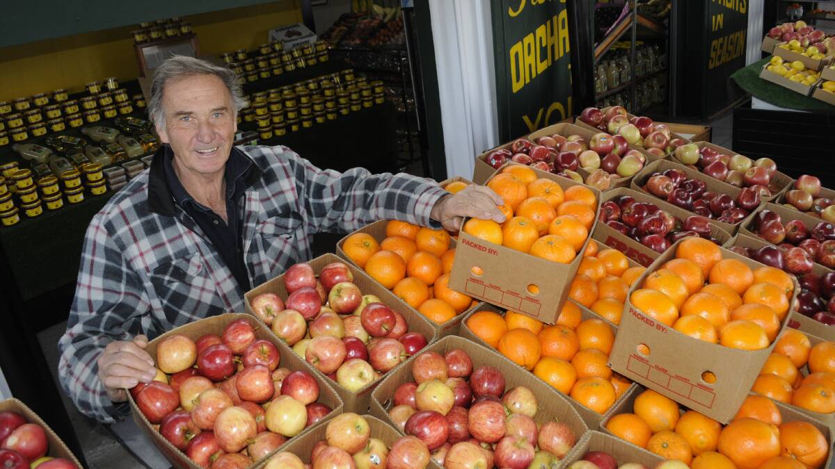 AFTER THE ROAD WORKS: Merrick Browne from Kelso Fruit Market is happy to be back open for business. Photo: CHRIS SEABROOK  072115cfruit1