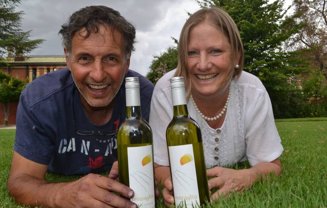 A LITTLE BOTTLER: Mark and Sandy Renzaglia with some bottles of their 2013 Bella Luna Chardonnay which has made it onto the wine list at Government House in Sydney. Photo: BRIAN WOOD 031116wine