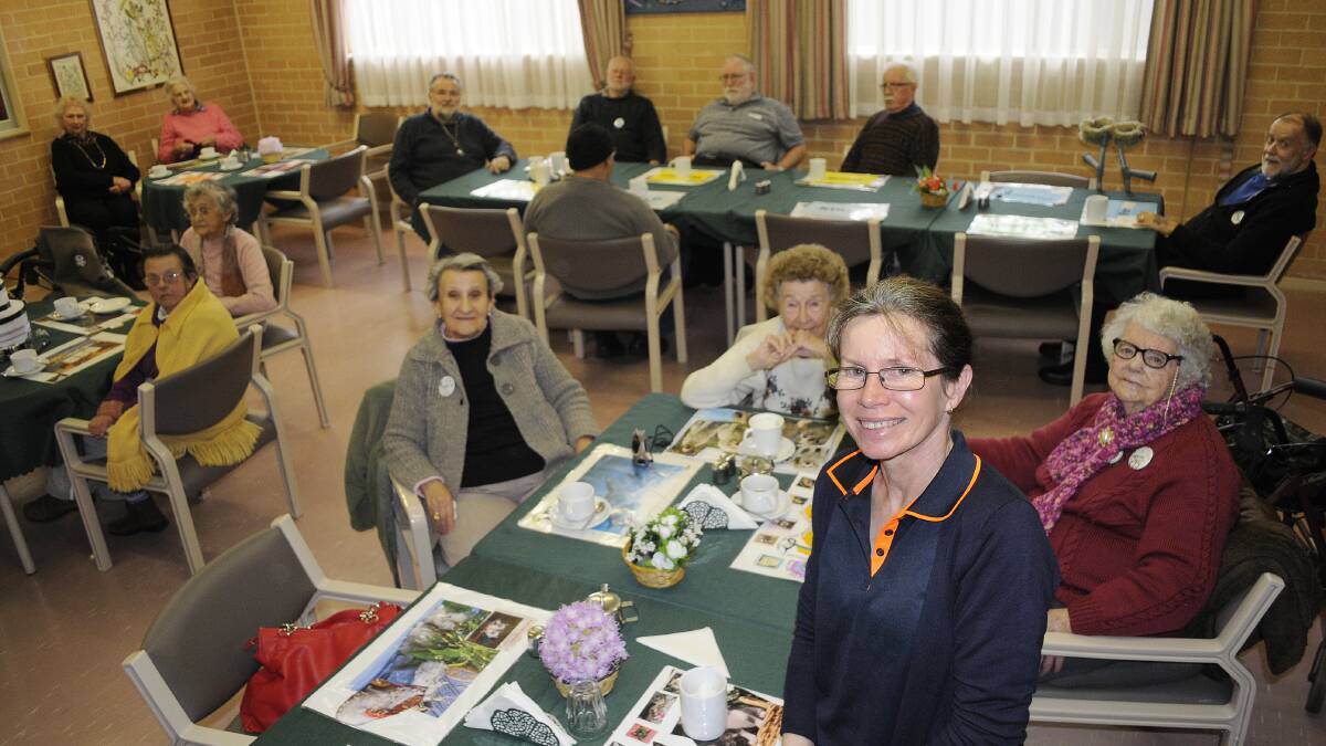 DEMAND IS INCREASING: Bathurst Seymour Centre manager Terisa Ashworth, pictured with senior citizens and carers who frequent the centre, said it is important to plan for Bathurst’s ageing population. Photo: CHRIS SEABROOK 071514cseymour