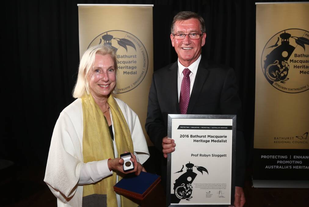 WINNER: 2016 Bathurst Macquarie Heritage Medal recipient Professor Robyn Sloggett with mayor Gary Rush on Saturday night. 050916medal