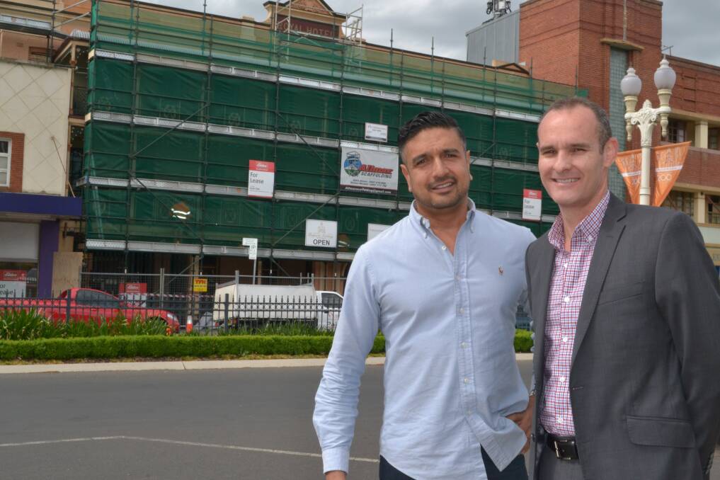 ICONIC BATHURST: Ash Lyons and David Nicoll outside the iconic Royal Hotel in William Street which is undergoing a major facelift. 102115royalhotel