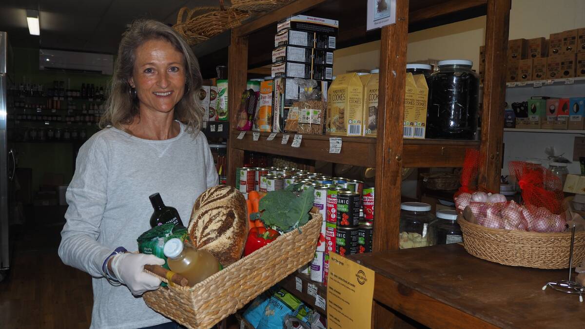 WHOLESOME GROCERIES: Bathurst Wholefood Co-Op volunteer Diana Hibberson with an assortment of items available from the store.