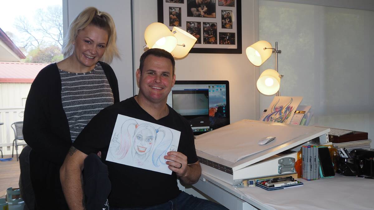 JOKER'S MUSE: Amy and Duane James in their home studio. Duane, who is a professional tattooist, has been running online drawing classes for children.