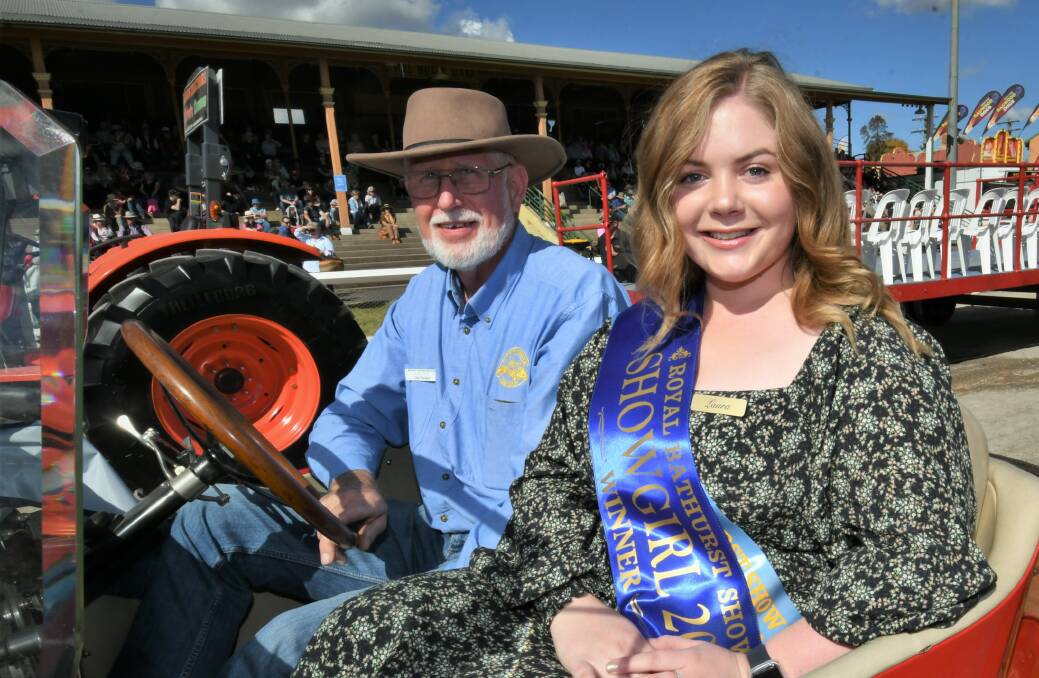 CROWNED: Royal Bathurst Show Showgirl winner Laura Van Uum with Jim Pitcher leading the Grand Parade on Saturday. Photo: CHRIS SEABROOK 