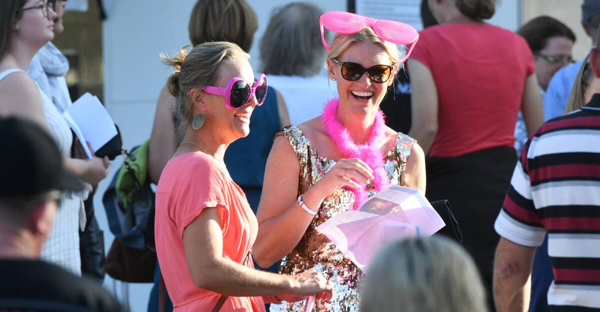 PRETTY IN PINK: Many dressed up in their finest Elton-inspired attire for Wednesday's concert. Photo: CHRIS SEABROOK