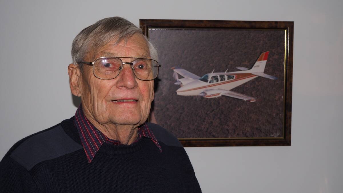 ACES HIGH: Order of Australia Medal recipient Jeremy Trevor-Jones with the Beechcraft Baron twin-engine charter plane he used to pilot. He has spent 20,000 hours of his life in the air. Photo: SAM BOLT 060619sbjerry1