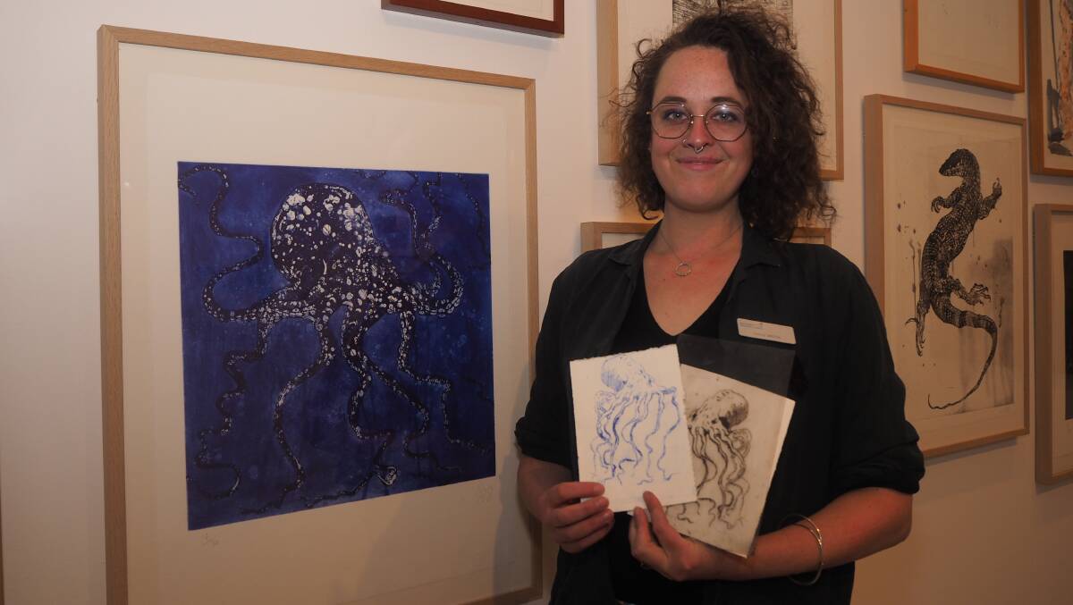 Bathurst Regional Art Gallery educator Lulu Smith with a series of prints that'll form the basis for one of the gallery's school holiday workshops. Picture: Sam Bolt