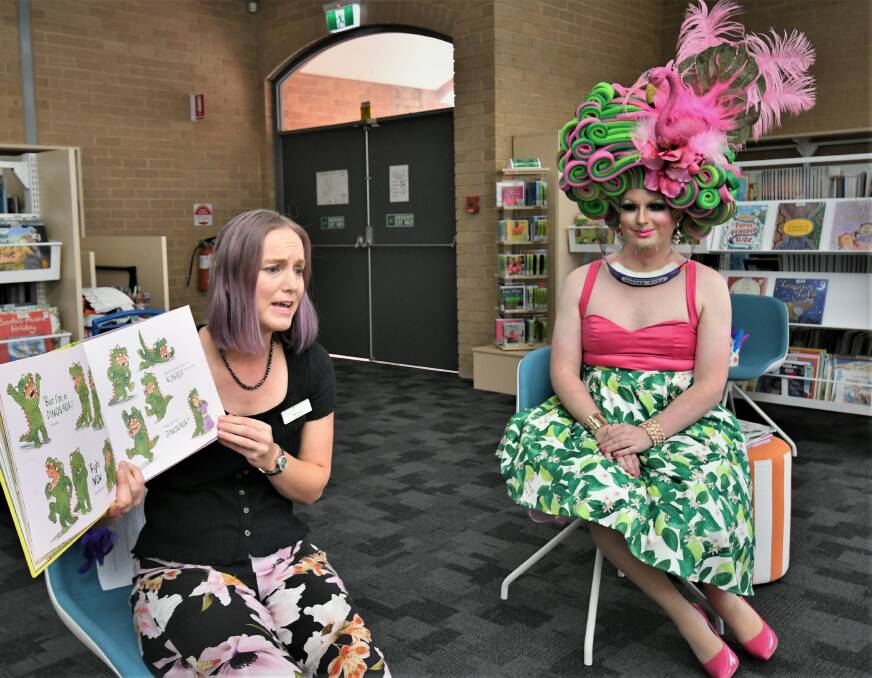 INCLUSIVE: Bathurst Library staff member Natalie Conn with Betty Confetti taking turns to read books to kids. Photo: CHRIS SEABROOK 011722cstorytym1