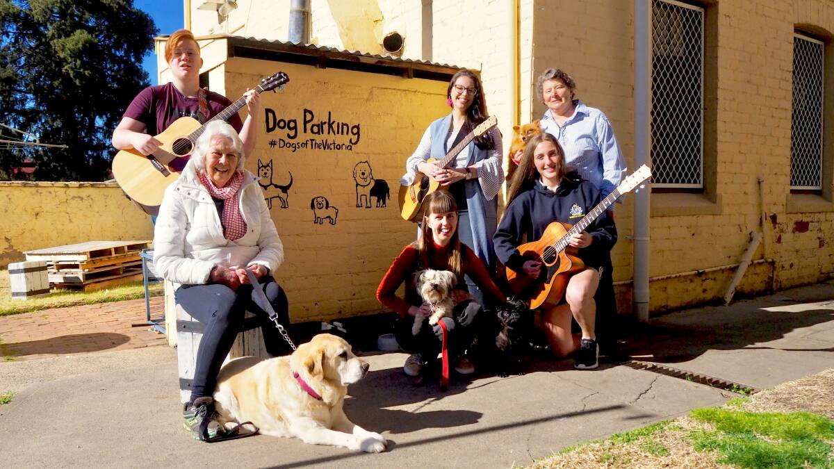 PUP SONGS: [back, from left] Tristan West, Sophie Jones and Margaret Gaal with 'Princess;' [front, from left] Chris FitzSimons with 'Muriel,' Abby Smith with 'Maxxi' and 'Boston' and Jasmine Gold. Photo: SAM BOLT