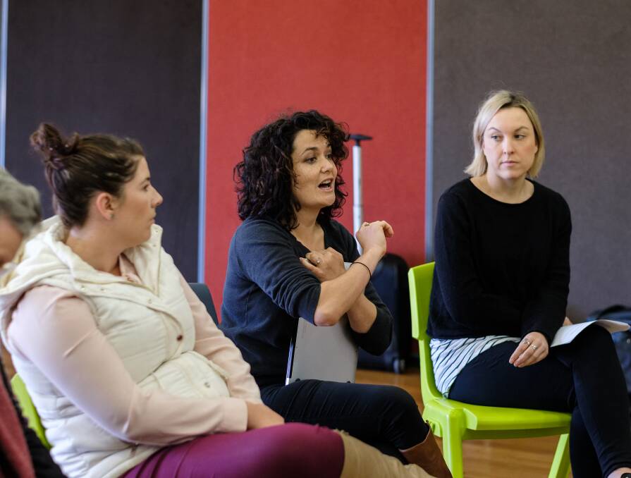INDUSTRY EXPERTS: Musician Leah Flanagan [centre] pictured mentoring at a Starting Ground workshop in Tamworth. Photo: ANTONY HANDS