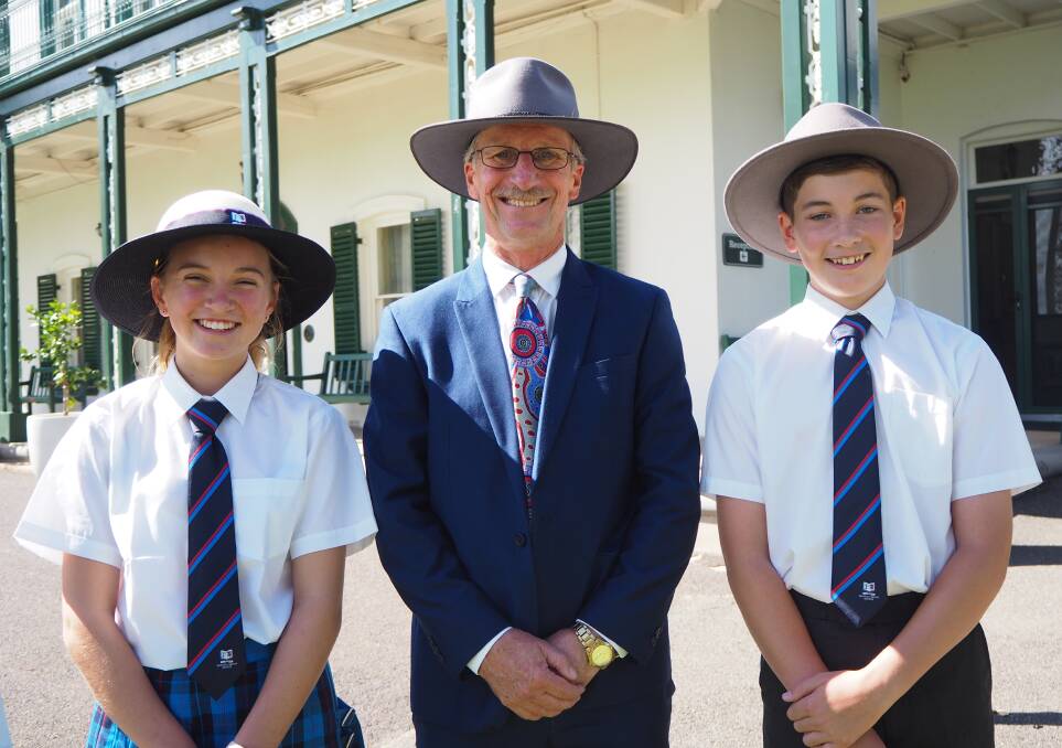 A NEW ERA: Scots All Saints College headmaster David Gates [centre] with middle school captains Emily Brown and Zane Newham. Photo: SAM BOLT