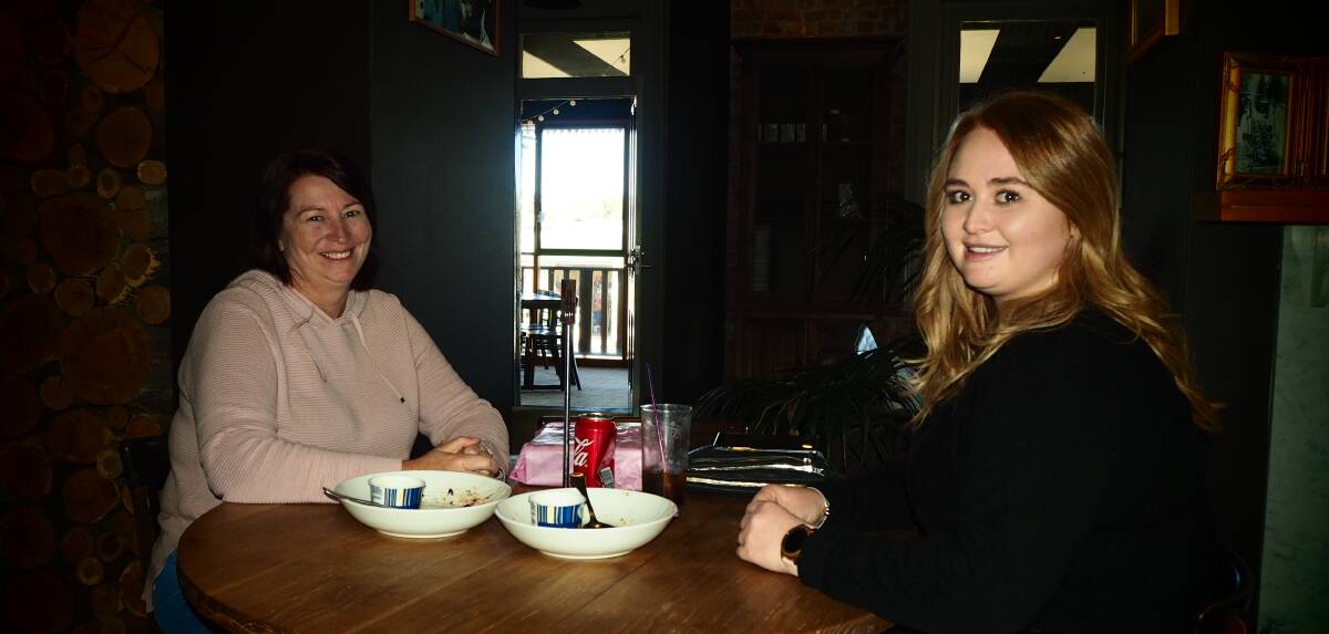 FIRST ORDERS: Kathy and Kaitlyn Whyte were among the first in for a meal at B Town BBQ after the venue reopened for dine-in customers on Friday. Photo: SAM BOLT