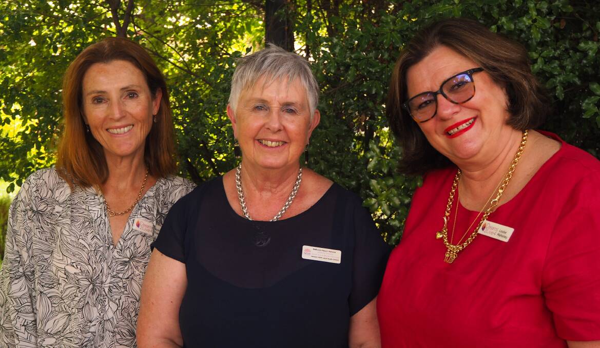 WISH FULFILMENT: Bathurst Health Service senior oncology social worker Joanne Young [centre] with Dreams2Live4 dream maker Annabel Powell and chief executive officer Louise Mahoney. Photo: SAM BOLT