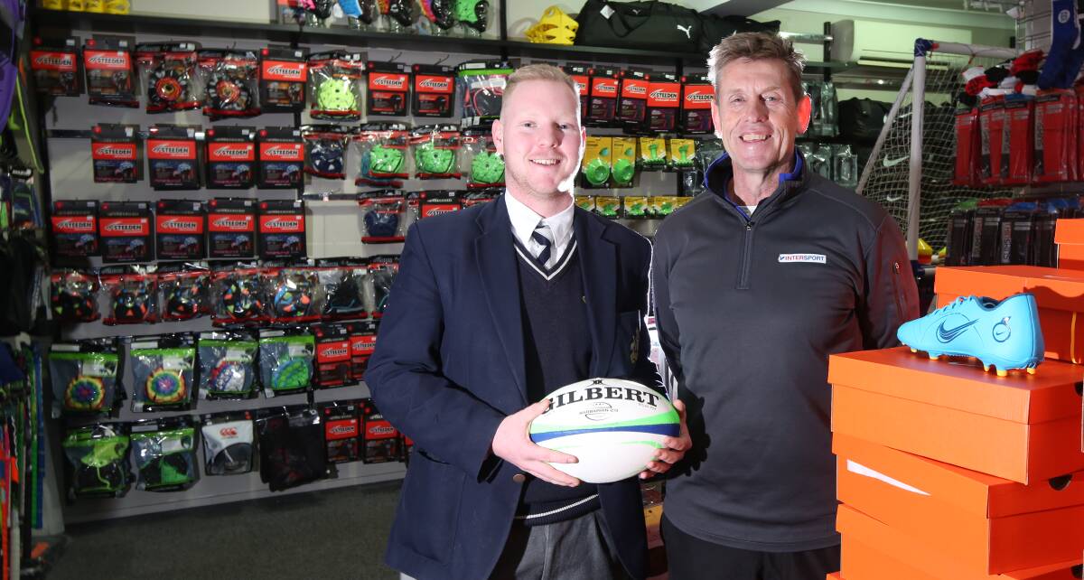 St Stanislaus' College Year 12 student Caden Taylor with Intersport Bathurst owner Shane Cantrill. Photo: PHIL BLATCH