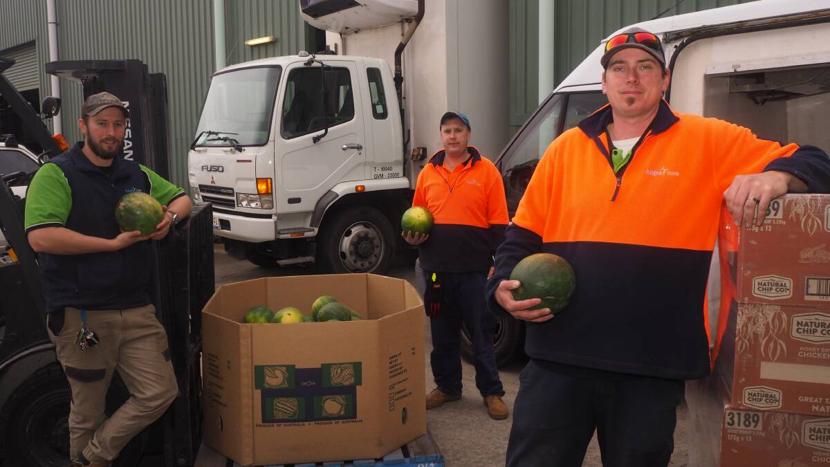 BEARING FRUIT: Hope Care operations and welfare services manager Elliot Redwin with volunteer James Reed and The Junktion manager Justin Fowler. Photo: SAM BOLT