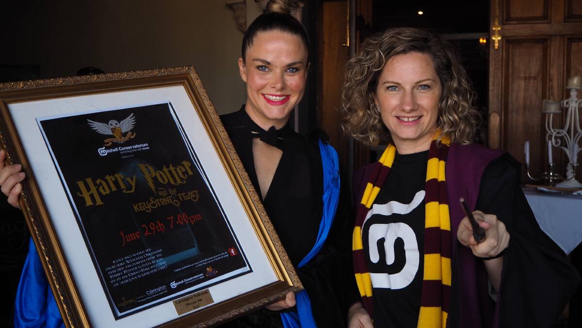 OFF TO HOGWARTS: Keystone 1889 owner Trish Carr and Mitchell Conservatorium publicity officer Lauren Hagney have a magical feast in store for Bathurst. Photo: SAM BOLT
