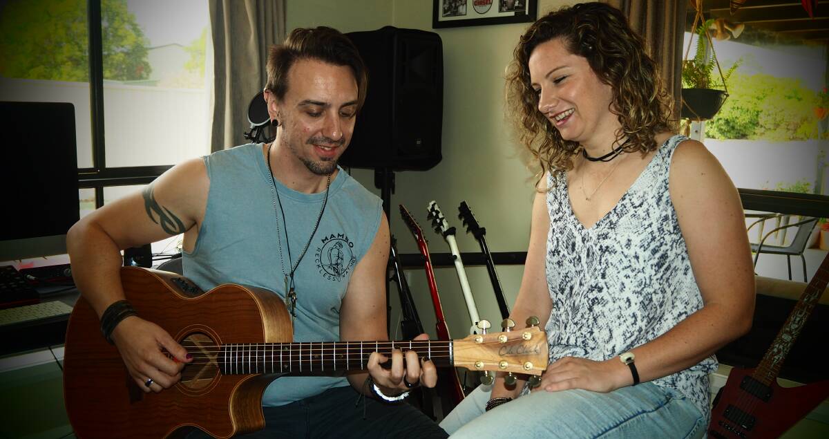 FINDING A BALANCE: Momentum's Dave Webb and Lauren Hagney are set to continue their dedicated approach to songwriting and gigs in 2020. Photo: SAM BOLT