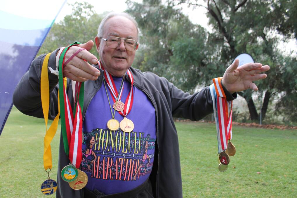 DECORATED: Darryl Radburn with all his medals. Photo: SUPPLIED