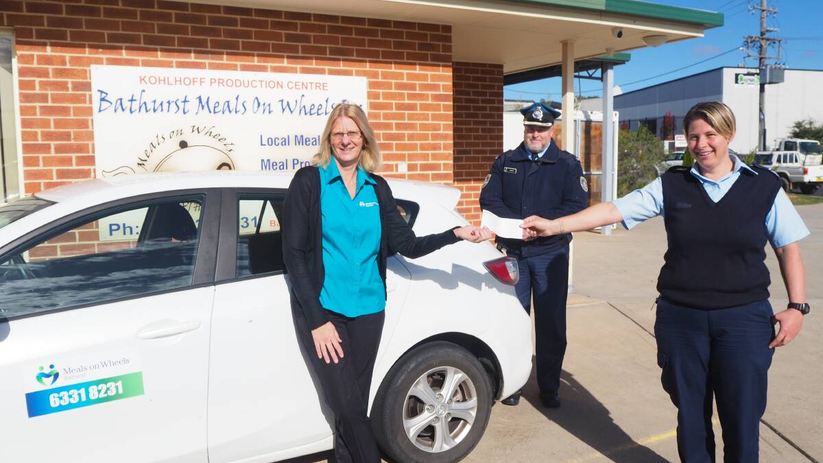 DONATION: Meals on Wheels Bathurst's Linda Roszkiewicz with Kirkconnell Correctional Centre's Dale Ashcroft and Kylie Wright.