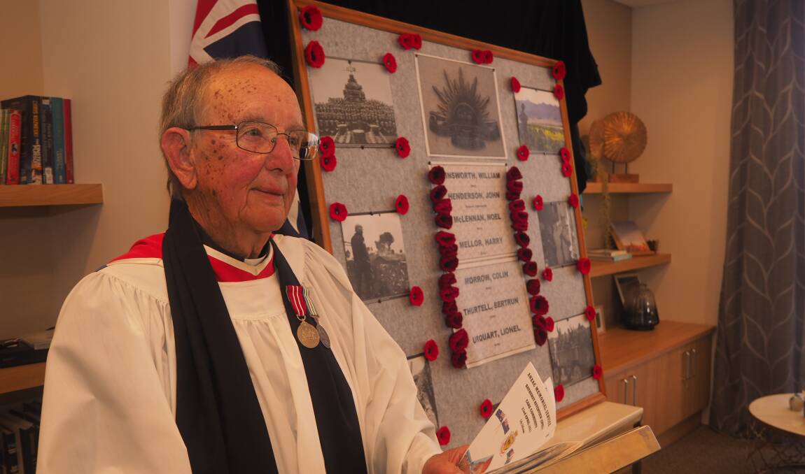 PAUSING TO REMEMBER: RSL Sub Branch chaplain Reverend Howard Knowles leads an Anzac service at Bathurst Riverview Care Community on Friday. Photo: SAM BOLT