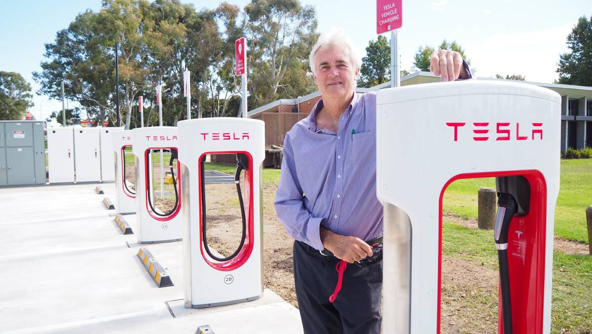 NEW POSSIBILITIES: Bathurst councilor John Fry says the new permanent Tesla Supercharger station is a welcome step forward for a sustainable future. Photo: SAM BOLT