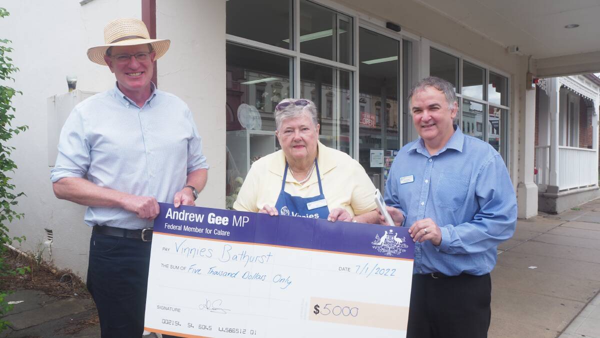 POWERING AHEAD: Calare MP Andrew Gee with Vinnies Bathurst volunteer Jill Gordon and Vinnies North West regional retail manager David Powter. Photo: SAM BOLT