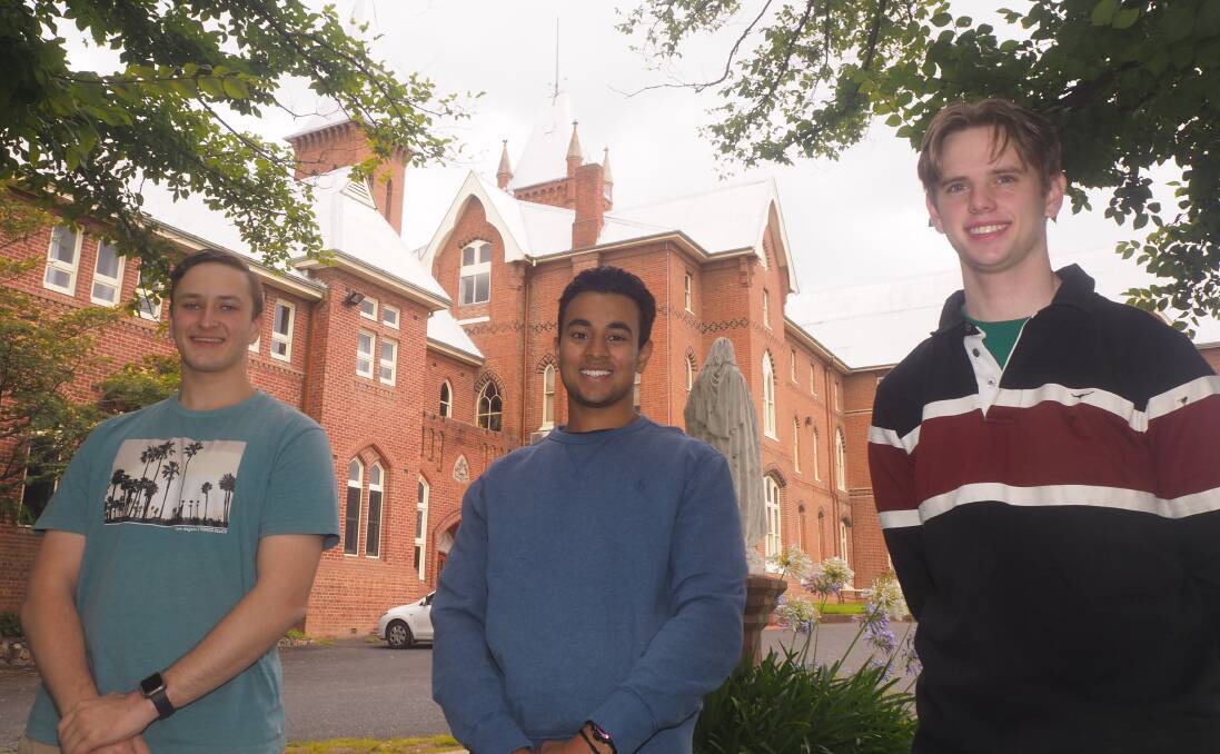 RELIEF: St Stanislaus' College graduates Peter Woodhead, Jacob George and Nick Parnell are all satisfied with their results. Photo: SAM BOLT 