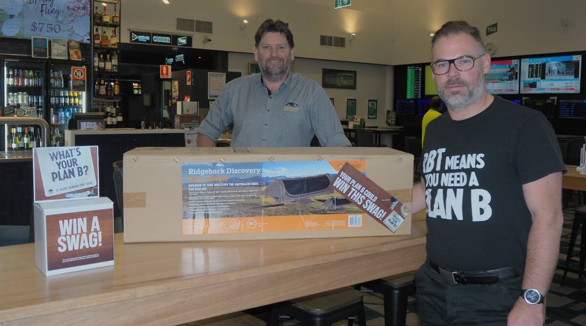 BAG A SWAG: Panthers Bathurst duty manager Matt Seaman with Central Tablelands road safety officer Andrew Cutts. Photo: SAM BOLT