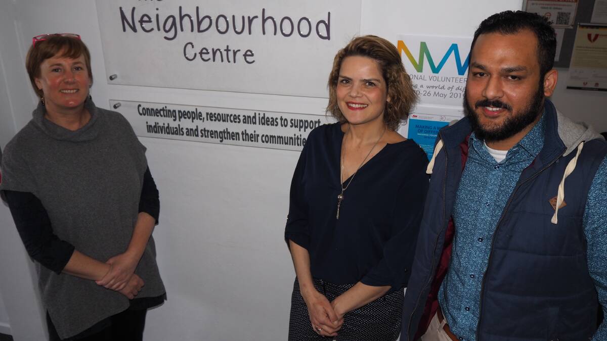 RECOGNITION: The Neighbourhood Centre's volunteer engagement officer Rebecca Wilson with volunteers Clara Bittencourt and Umair Tariq.