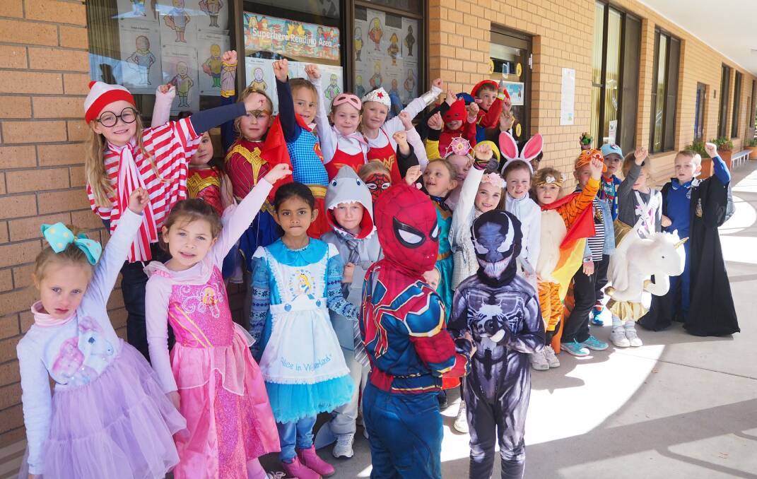 POWERFUL PERSONALITIES: St Philomena's School's kindergarten class dressed up as their favourite literary characters in celebration of Children's Book Week. Photo: SAM BOLT 082319sbsuper1