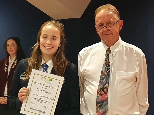 WINNER: Zoe Peters with Lions Youth of the Year western district finals judge Dean Colmer. Photo: SUPPLIED