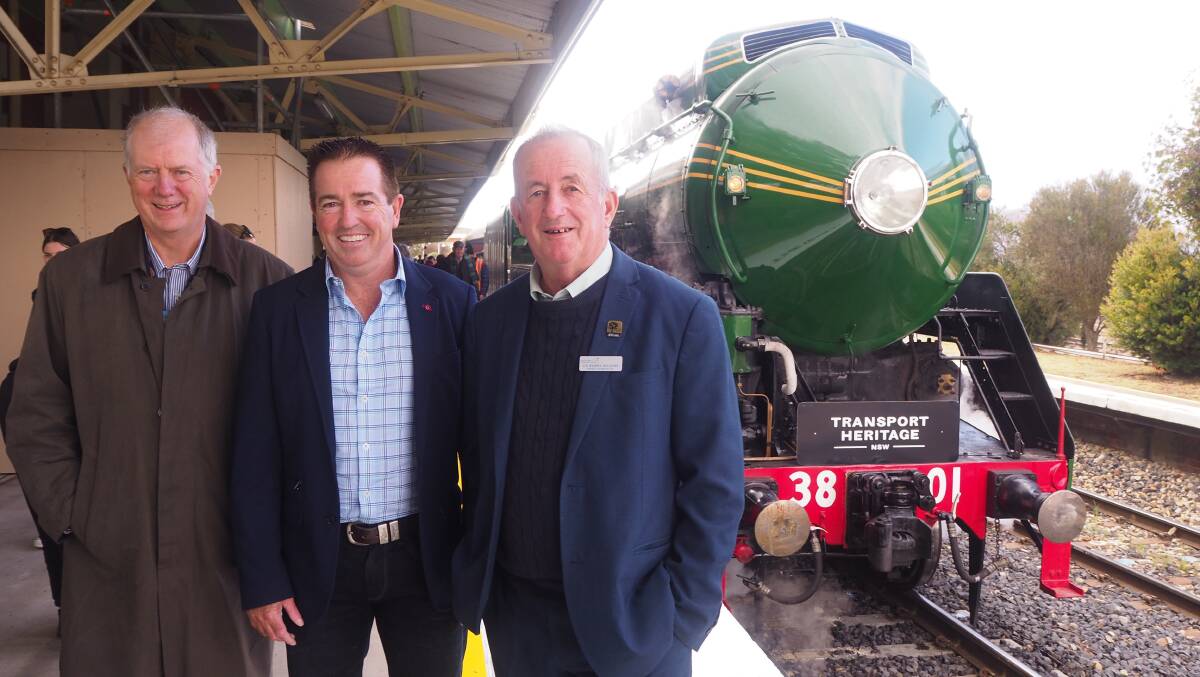 STEAMING IN: Transport for NSW acting deputy secretary Howard Collins with Bathurst MP Paul Toole and mayor Bobby Bourke. Photo: SAM BOLT