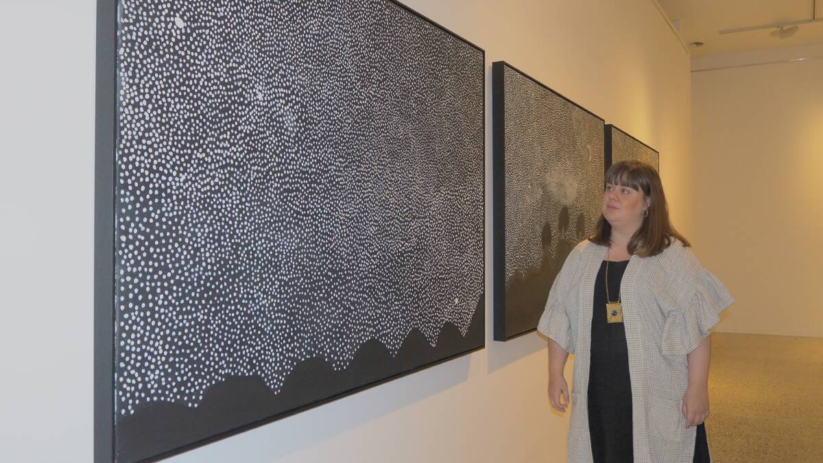 STARS: 'Void' curator Emily McDaniel with one of the featured works in the exhibition.