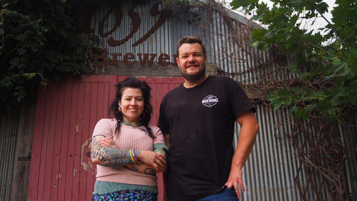 GARDEN OF SOUND: Beekeepers Inn manager Queenie Green and owner Mark Lockwood in front of the venue's brewery, 1859. Photo: SAM BOLT