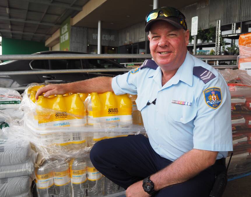 THIRSTY WORK: Bathurst Correctional Centre field officer Wayne Cole has been leading a group of local officers in a series of water deliveries to remote NSW towns experiencing severe drought. Photo: SAM BOLT 021419sbwayn1