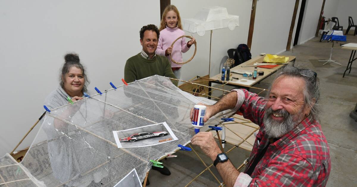 Michelle Graves, Bathurst councillor Jess Jennings with his daughter, Lola and facilitator Phil Relf during a 'Fast Cars and Dirty Beats' lantern workshop last year. Picture: Chris Seabrook