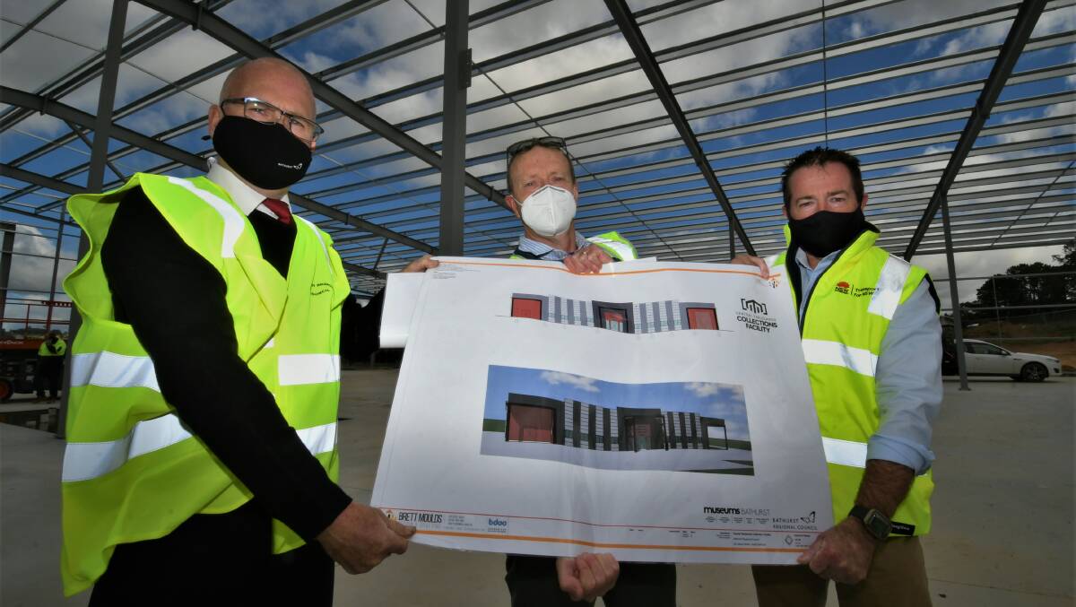 PROGRESS: Bathurst mayor Ian North, Central Tablelands Collections Facility project manager Tim Pike and Bathurst MP Paul Toole at the facility's Leena Street site on Tuesday. Photo: CHRIS SEABROOK